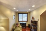 Loft workspace is a great place for homework or office work.
